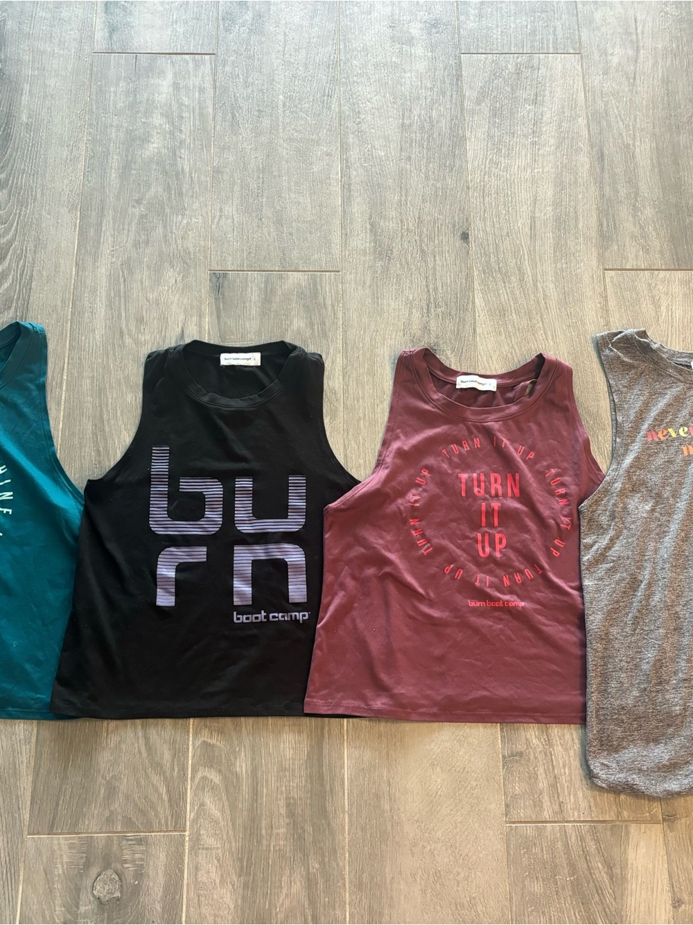 Collection of women’s Burn Boot Camp tank tops